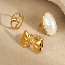 Load image into Gallery viewer, European and American Cross-Border Ins Niche Oval Egg-Shaped Pearl Ring Titanium Steel Ring Design Bow Open Ring